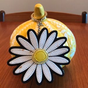 Kate spade Daisy keychain from outlet.